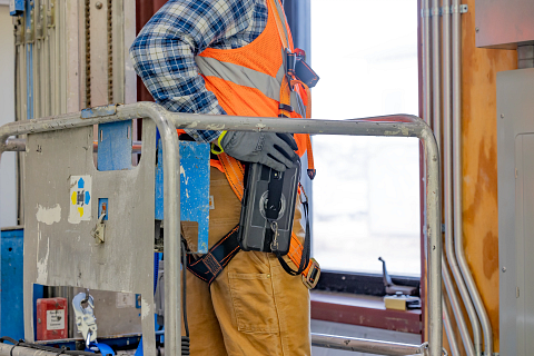 Brandon L. using a Tablet Belt Clip